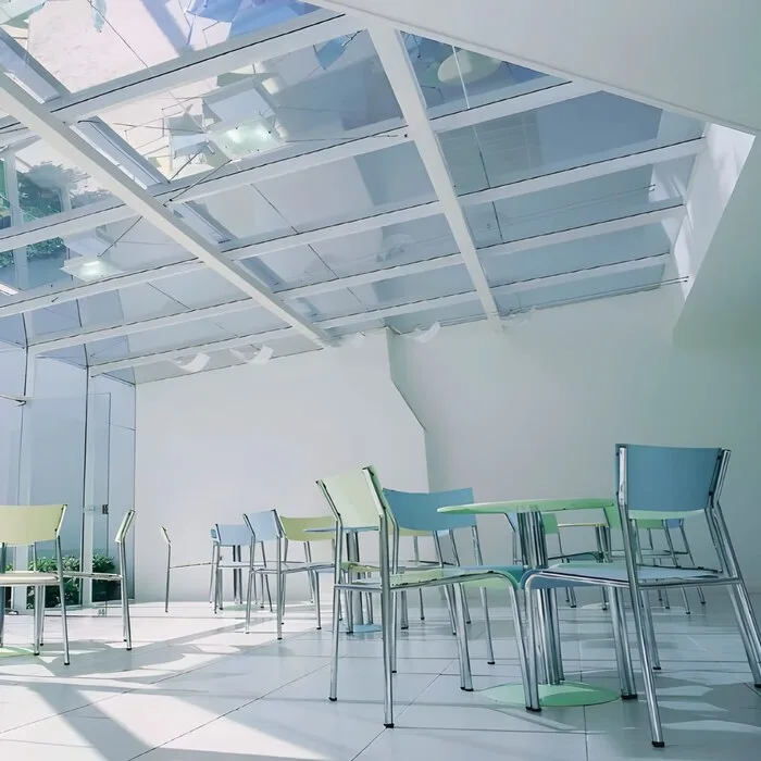 Exterior film applied to a glass roofing skylight to reduce heat, glare, and UV exposure while allowing natural light indoors.