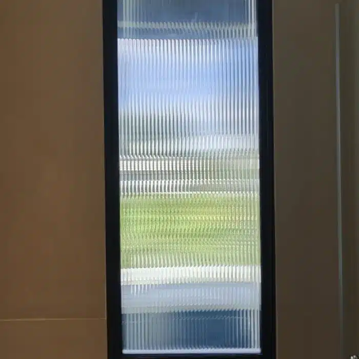 After - window glass with reeded film