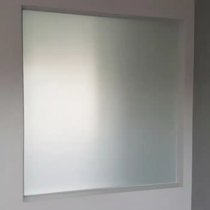 Full frosted privacy film applied on toilet glass, blocking visibility for bathroom privacy